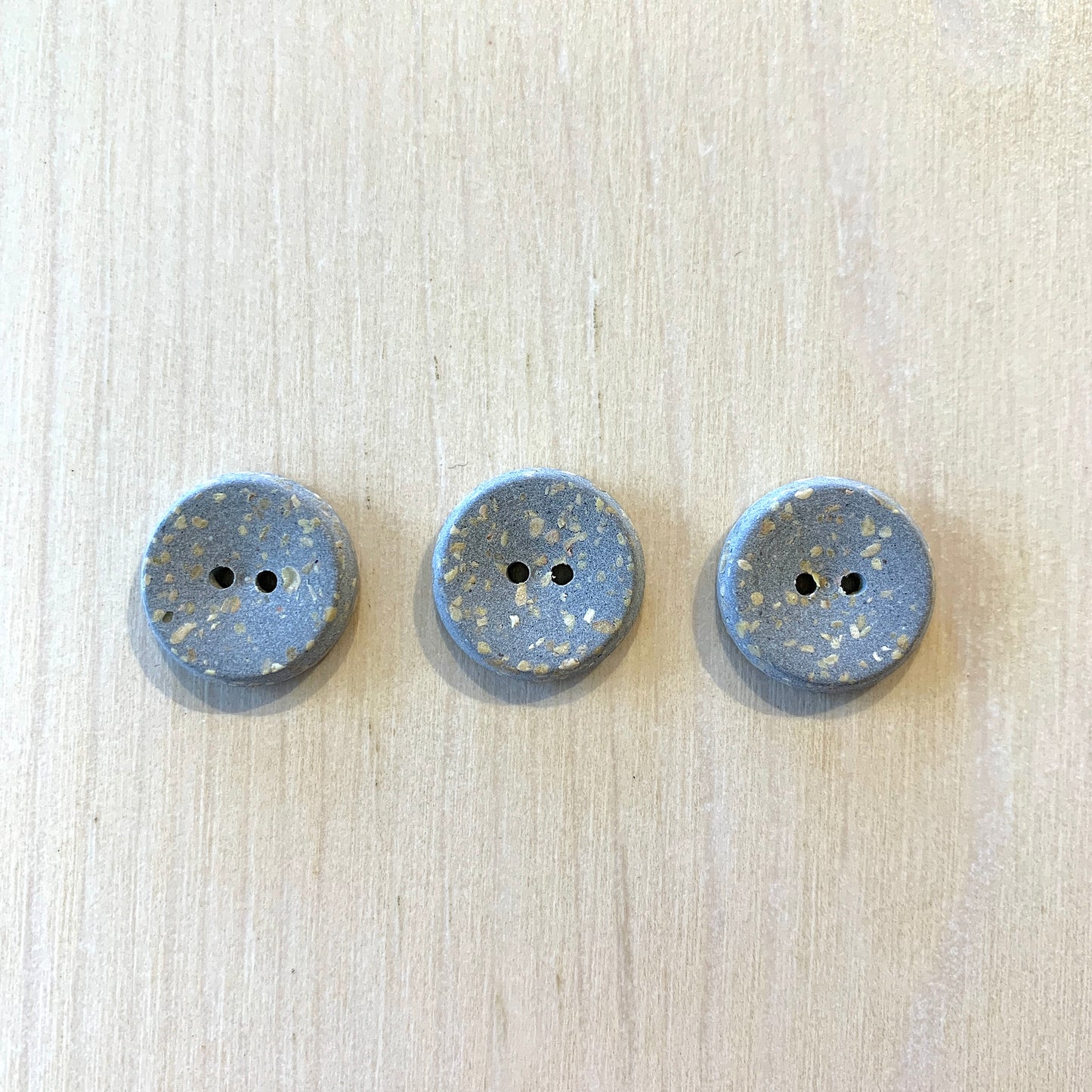 Boutons recyclés en polyester