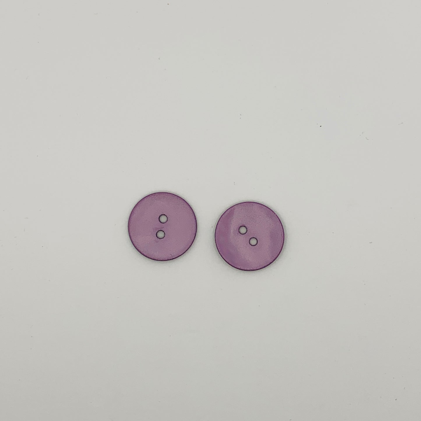 Boutons en nacre coloré
