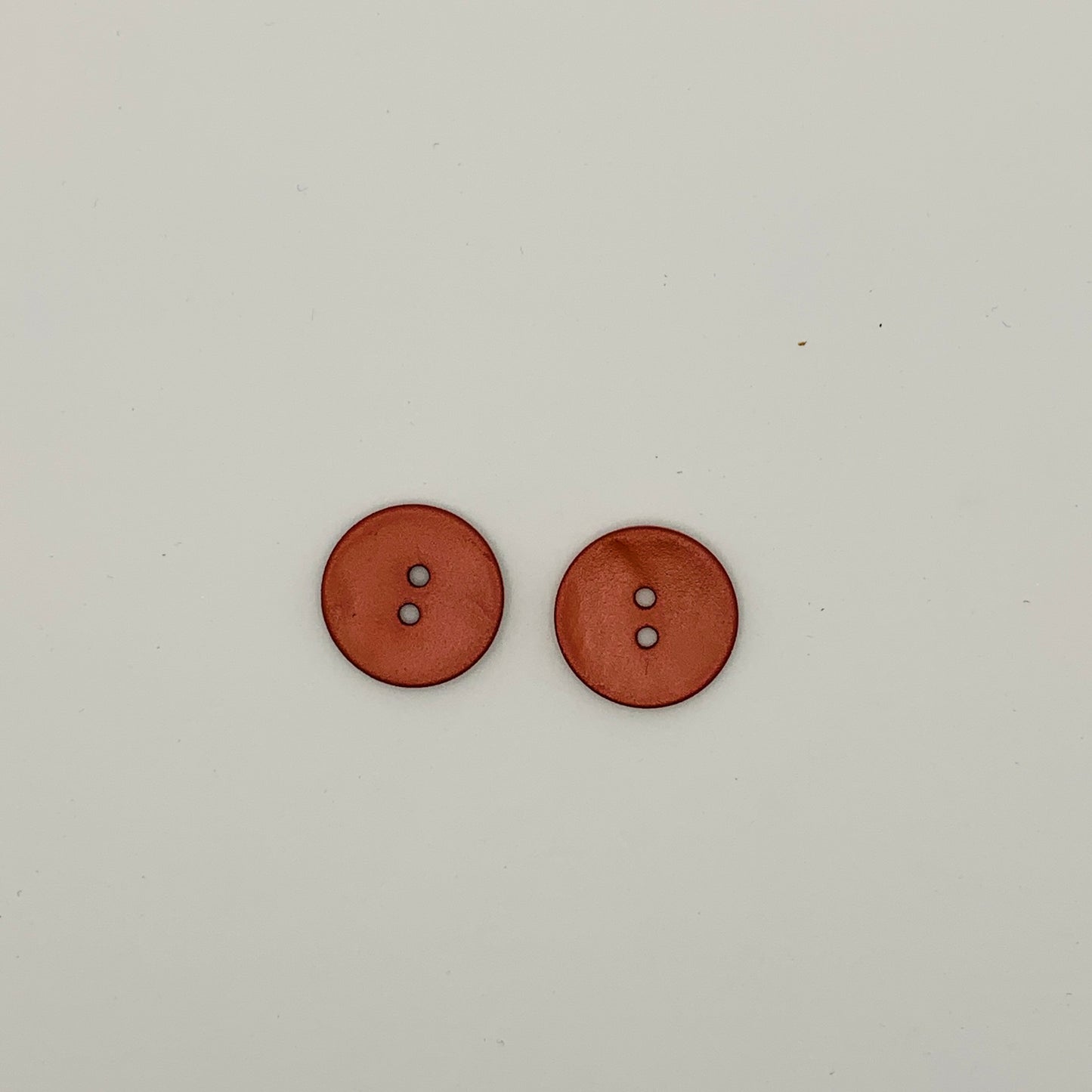 Boutons en nacre coloré